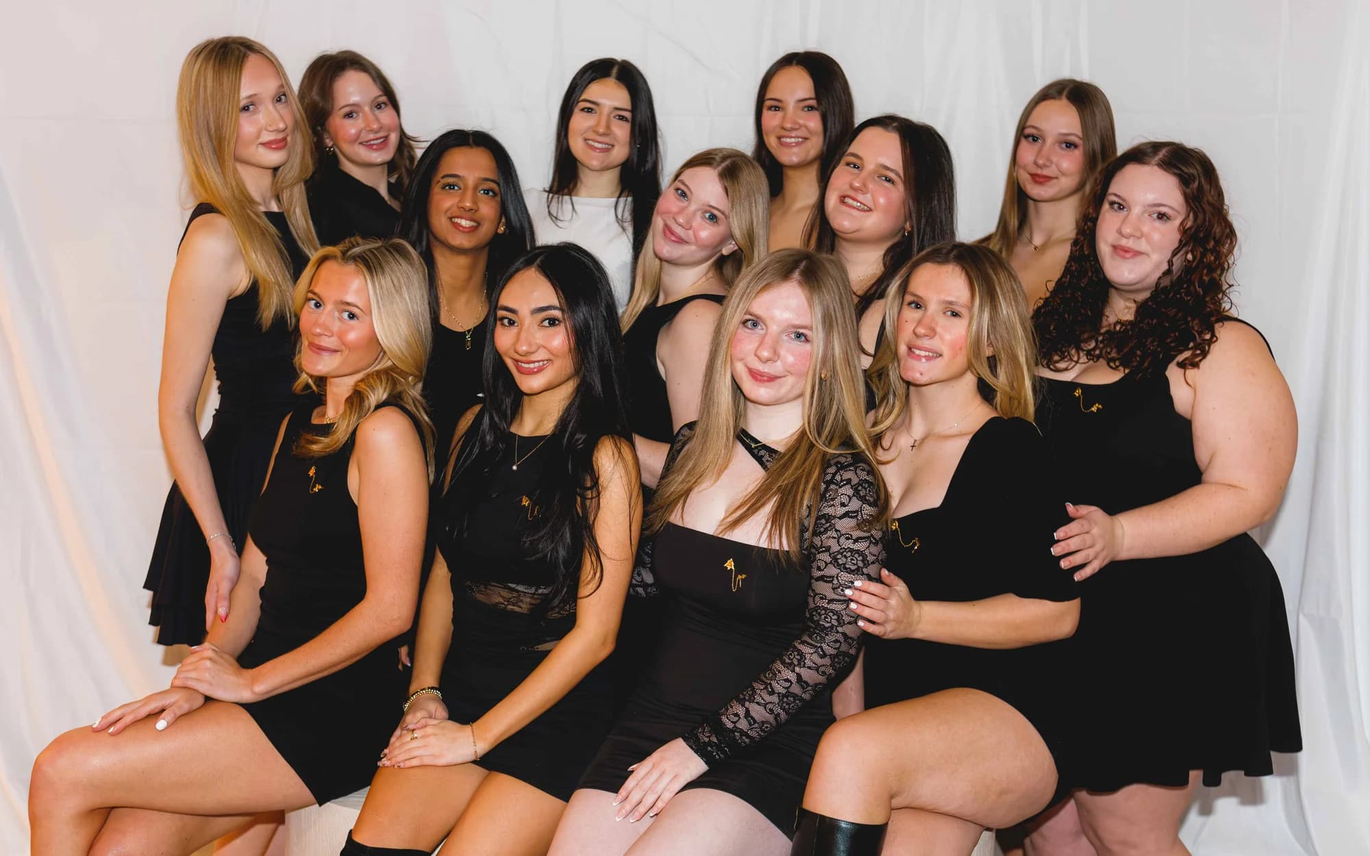 Dance team group photo in black dresses