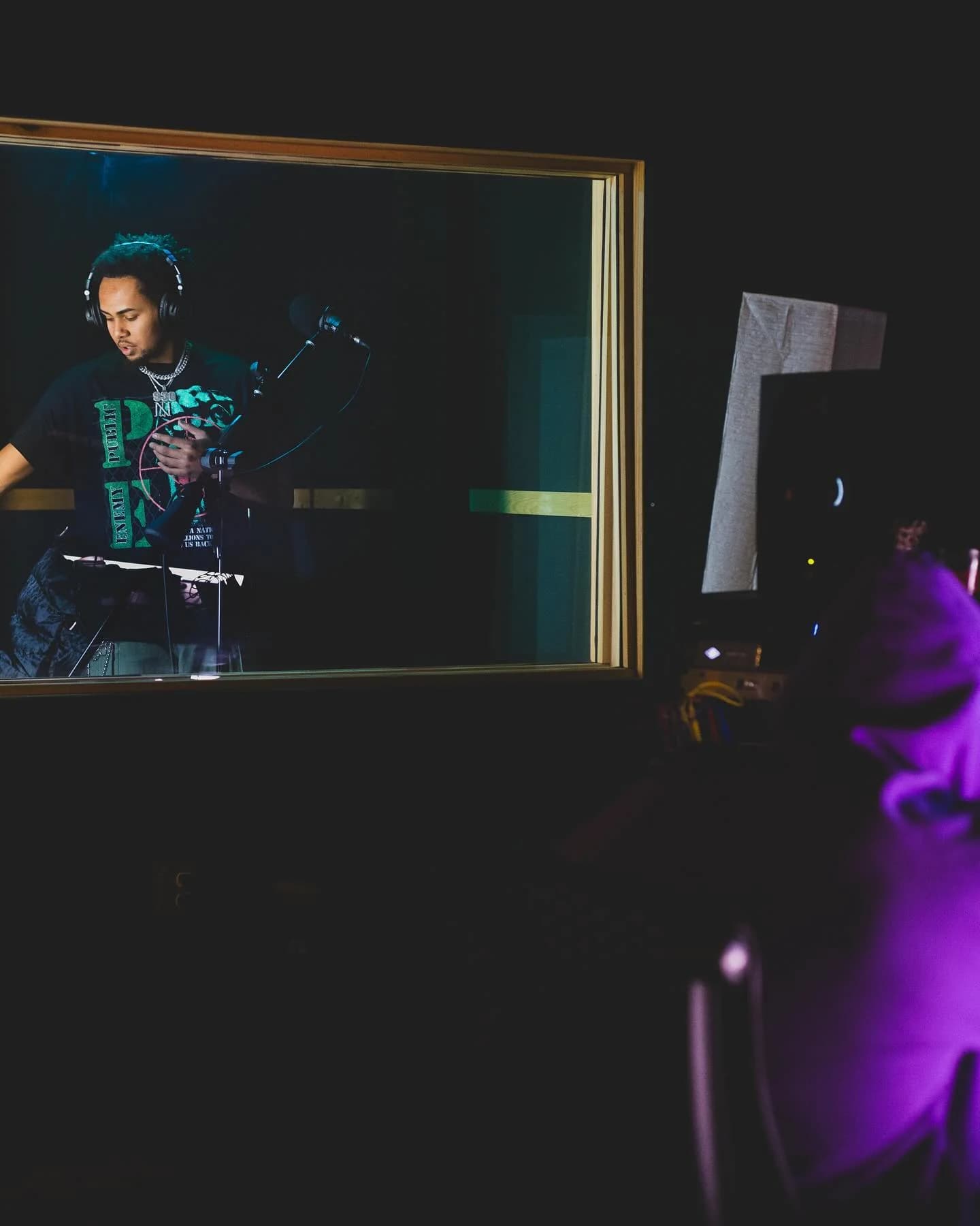 Recording studio session through glass